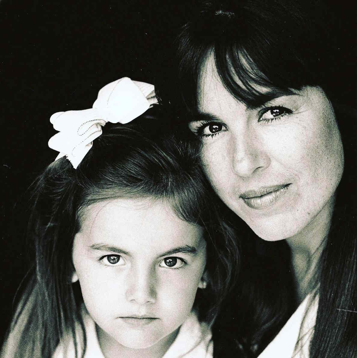 Camilla Belle with her mom in childhood